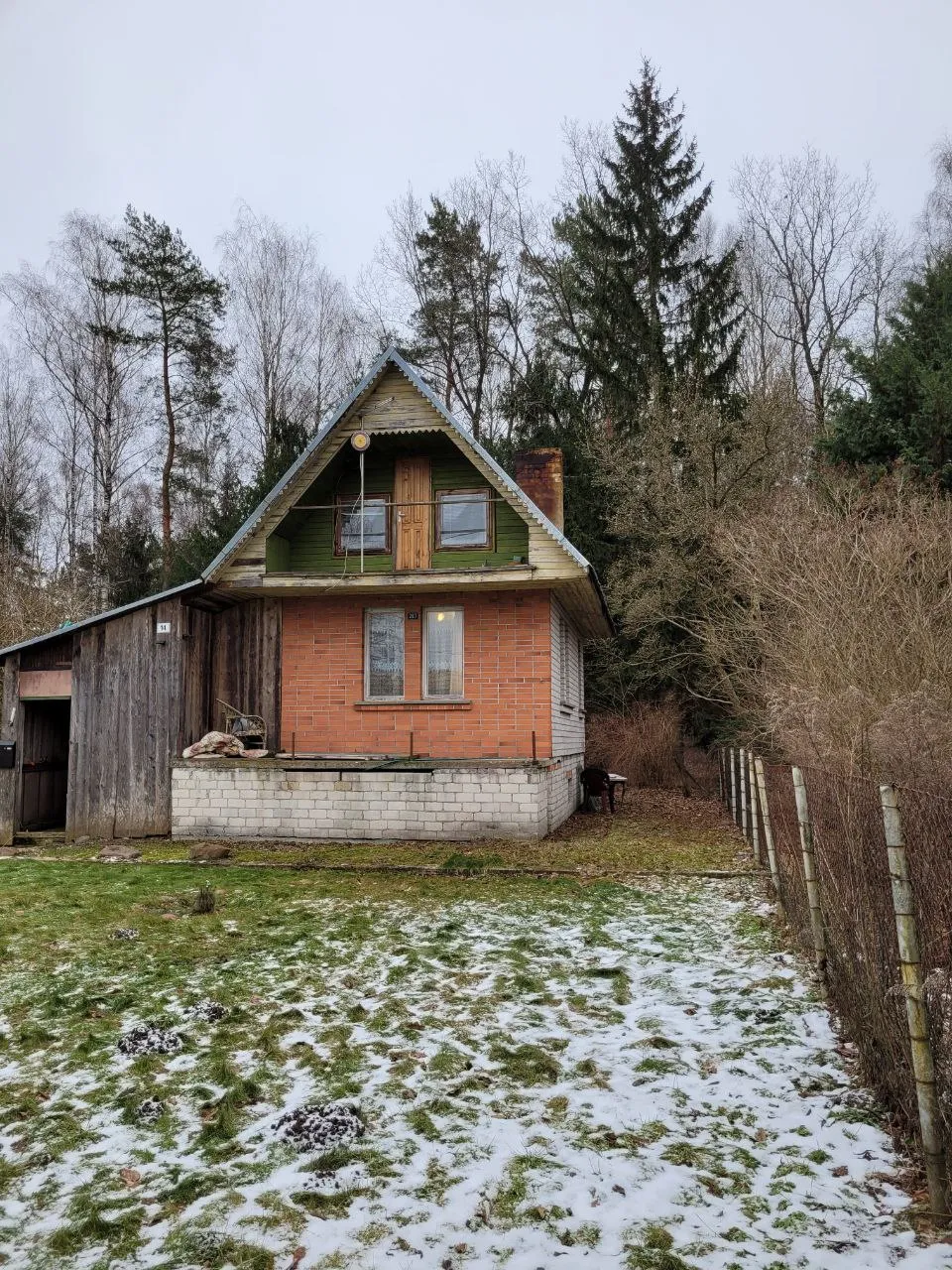 Sodo namas šalia Kauno marių